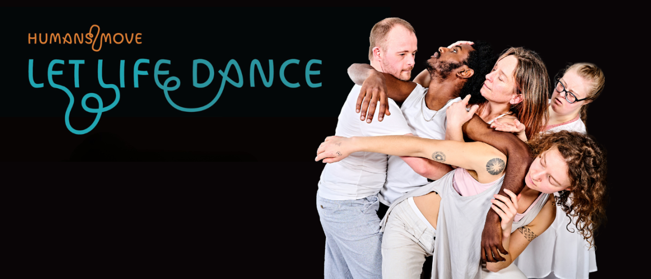 Dancers in white costumes huddled together and wrapped around one another